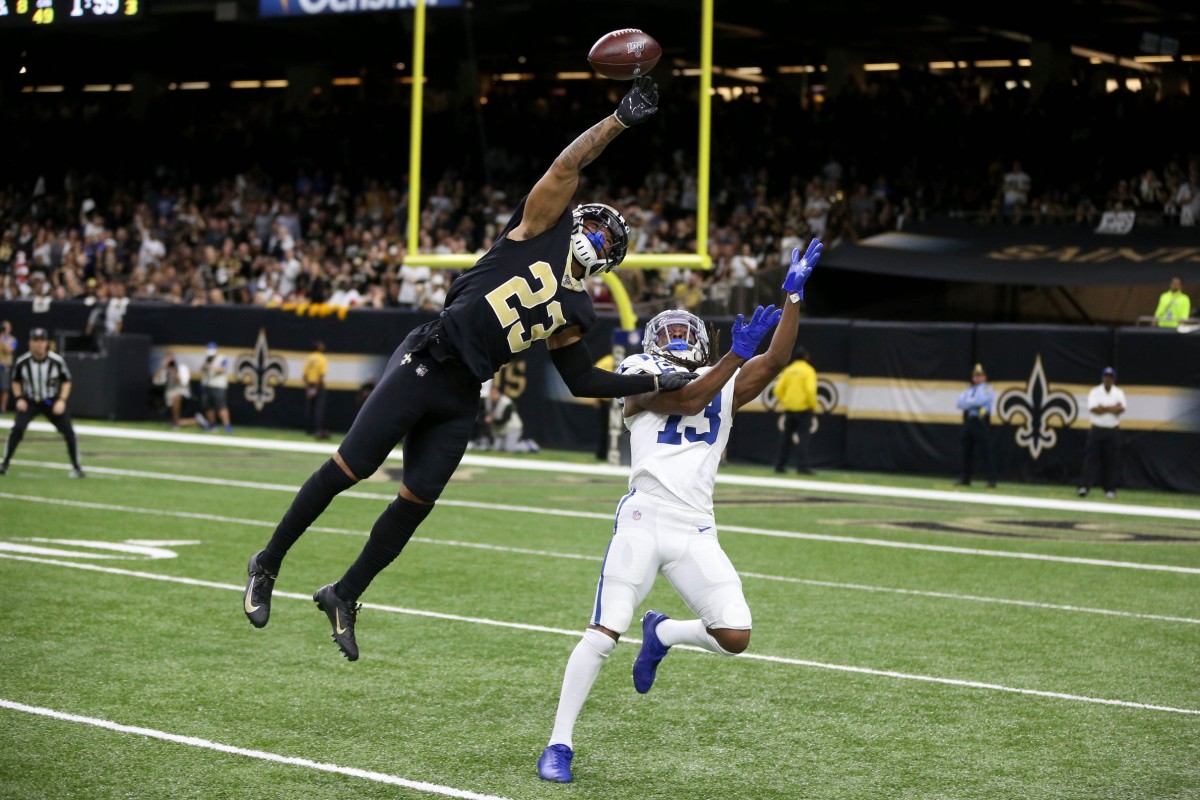 New Orleans cornerback Marshon Lattimore (23) defends a pass intended for Colts receiver T.Y. Hilton (13). Mandatory Credit: Chuck Cook-USA TODAY Sports